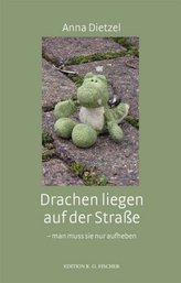 Drachen liegen auf der Straße
