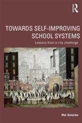  Towards Self-improving School Systems